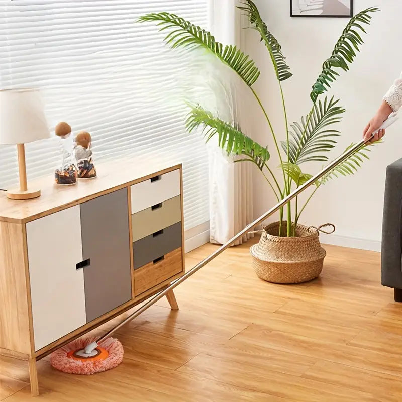 Self-Wringing Spin Mop