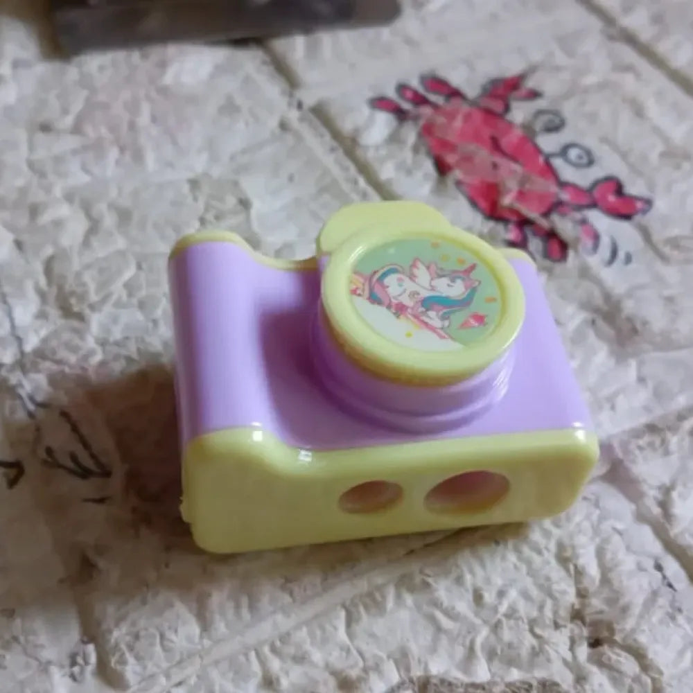 Camera-shaped pencil sharpener - office