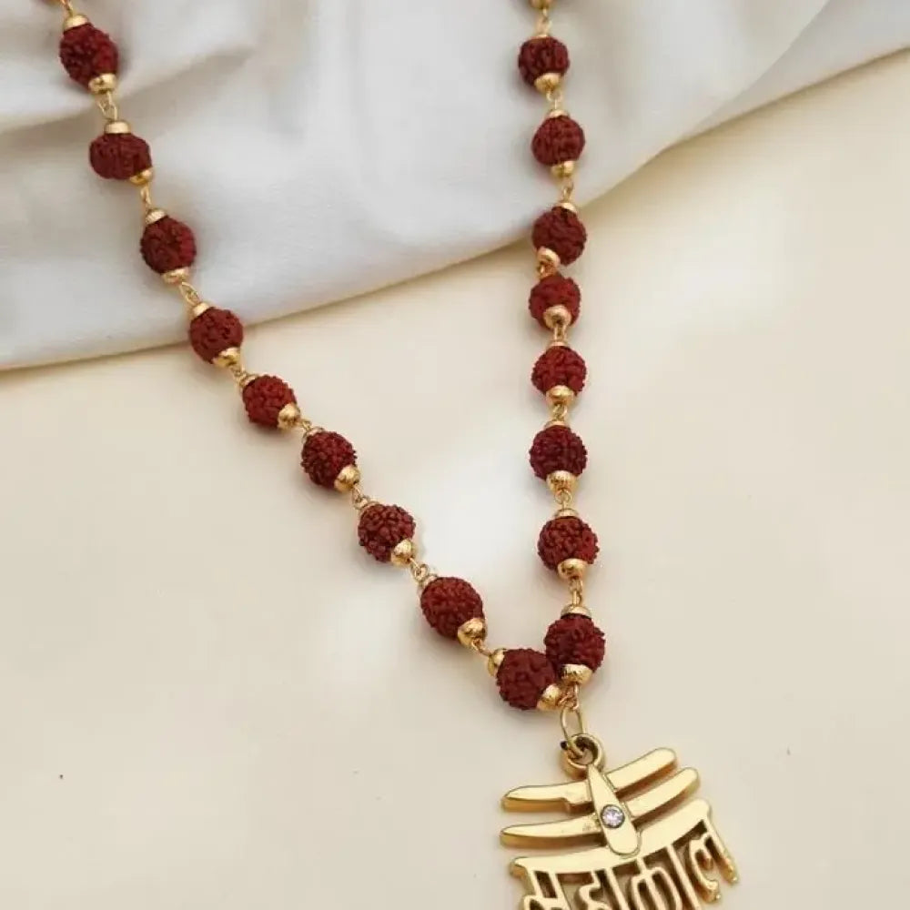 Traditional 108-bead rudraksha mala with ornate pendant necklace - potential heroes