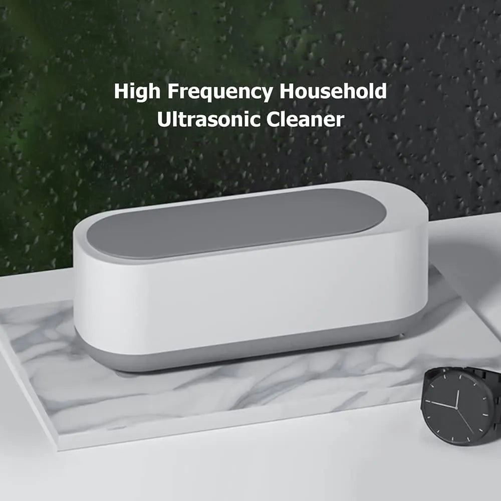 White and gray ultrasonic cleaner.
