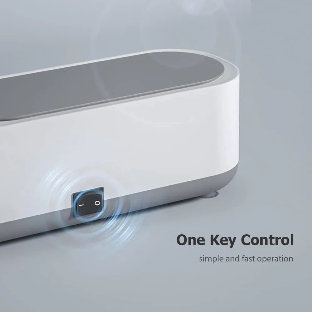 White and gray ultrasonic cleaner.