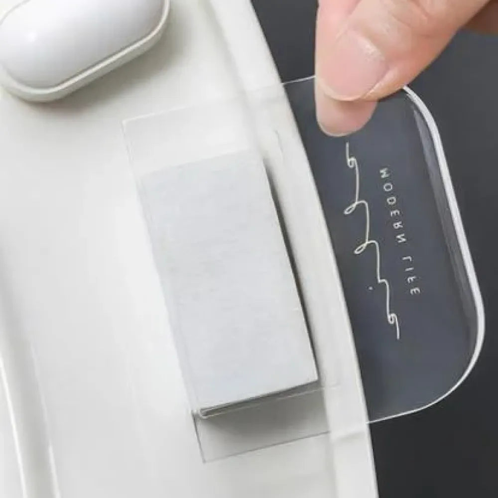 No-touch toilet seat lifters