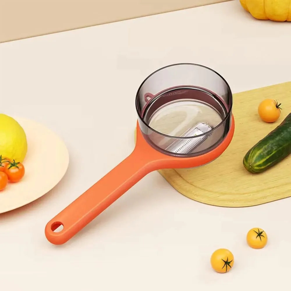 Peeler with storage box