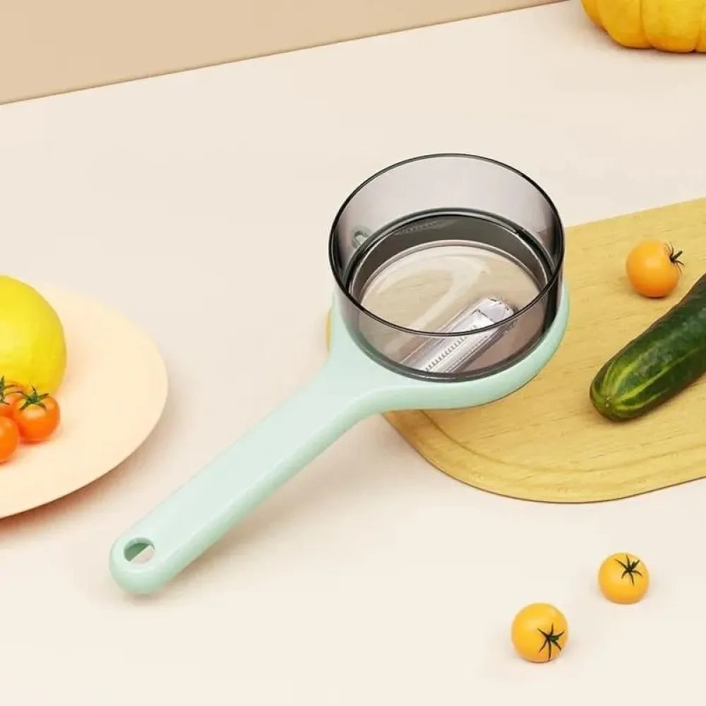 Peeler with storage box