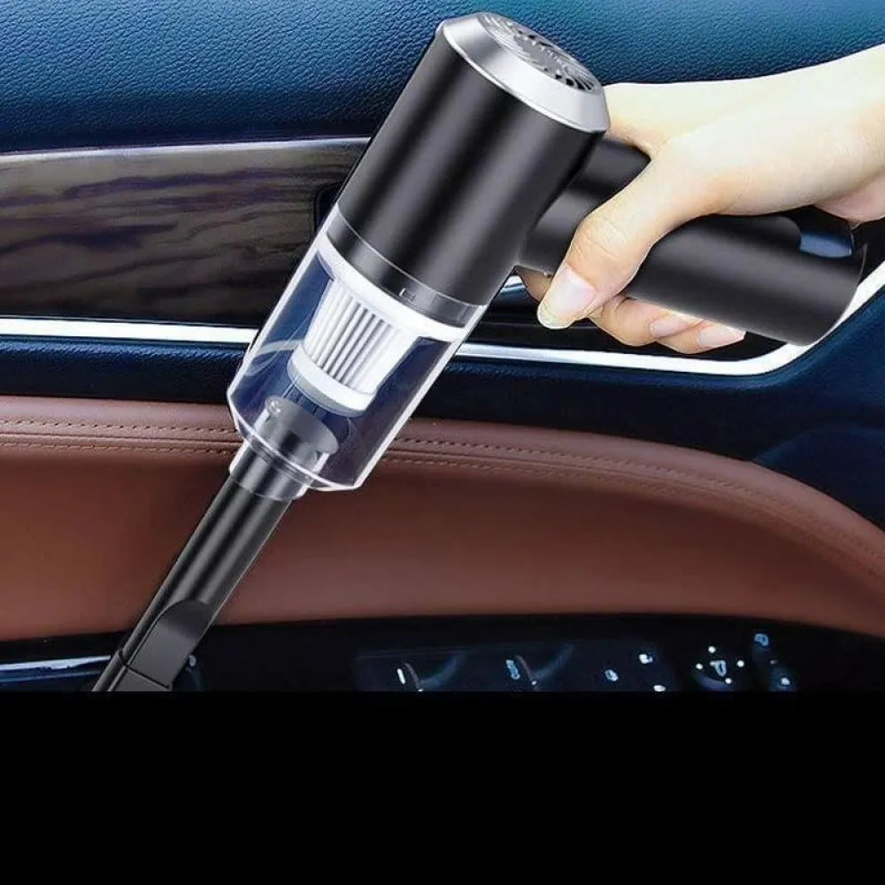 Handheld black vacuum cleaner.