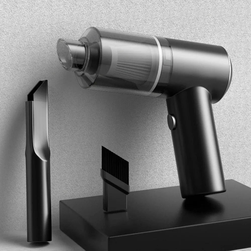 Black handheld vacuum with attachments.