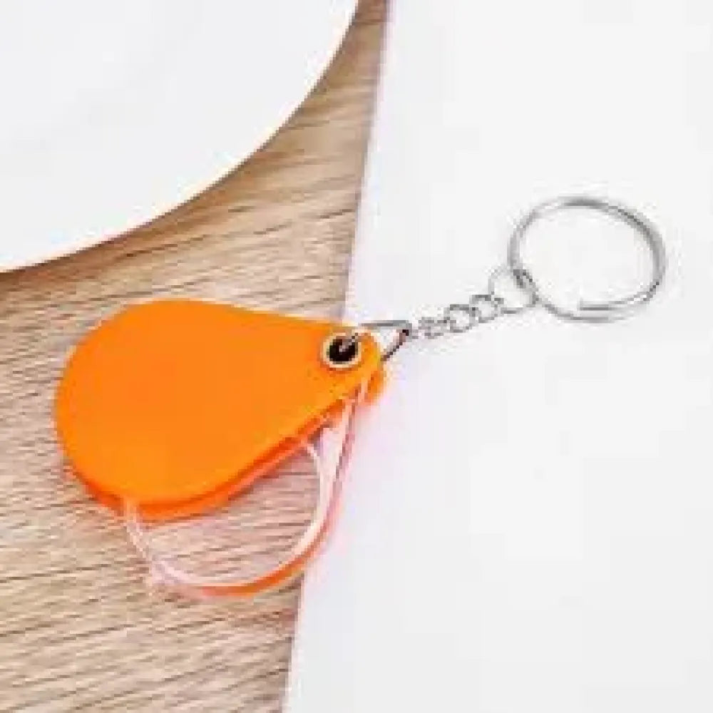 Portable keychain magnifier glass - office