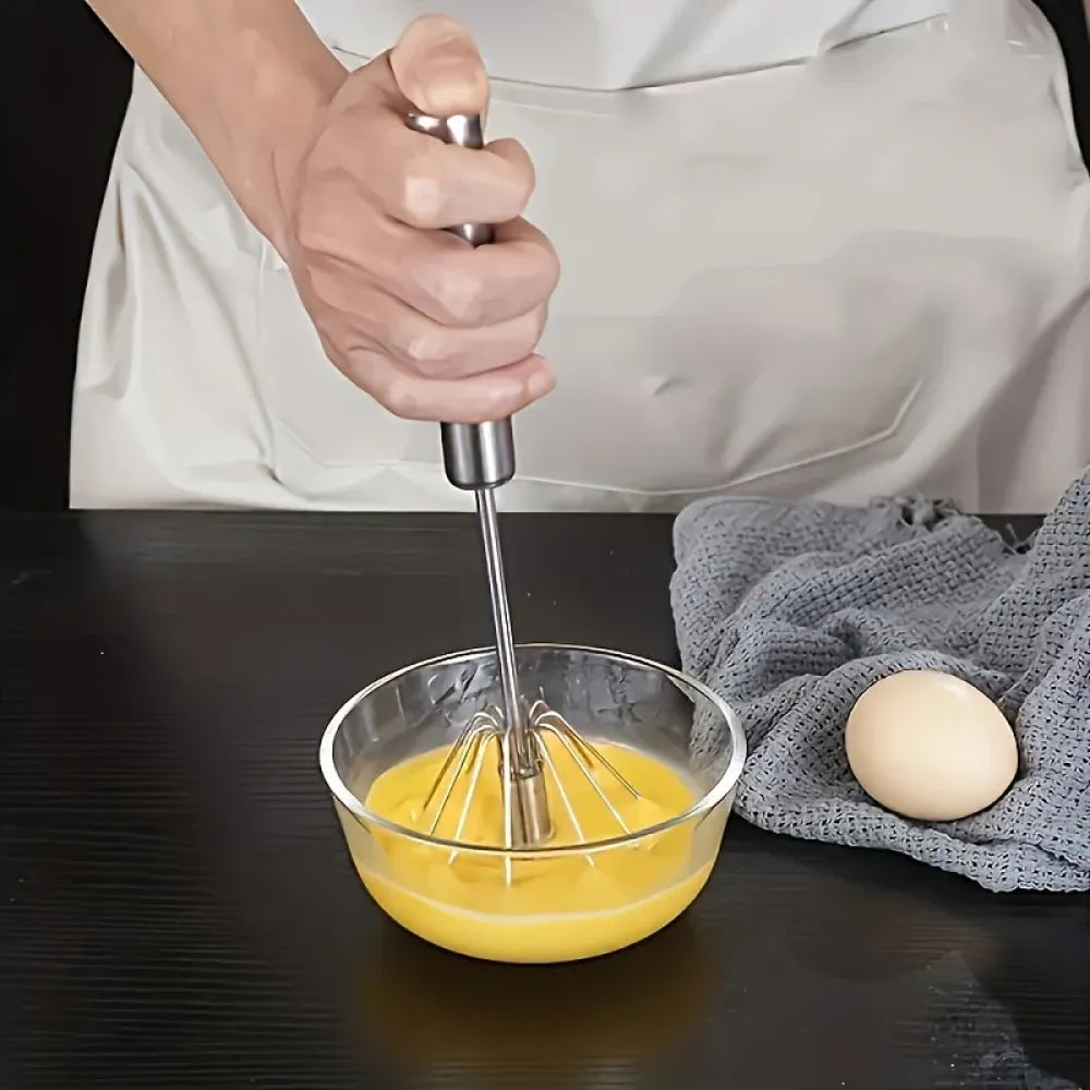 Push-button egg whisk - kitchen tool