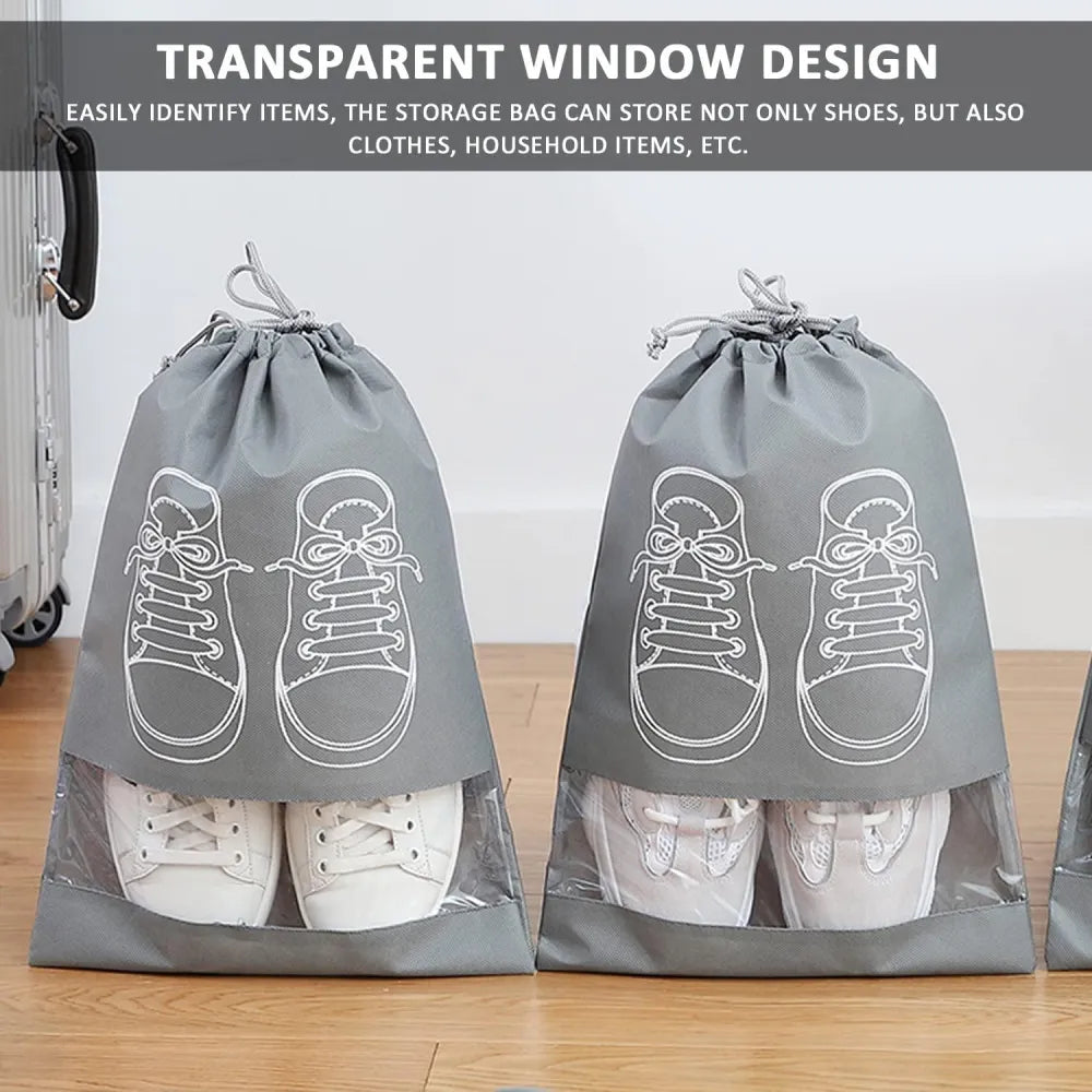 Gray shoe storage bags with transparent windows.
