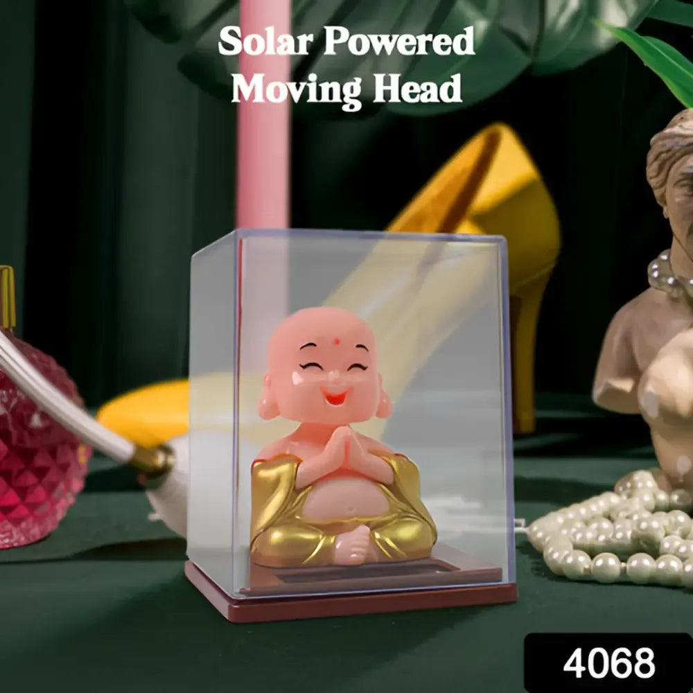Solar-powered nodding buddha ornament - automotive