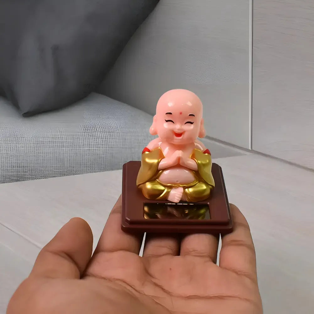 Solar-powered nodding buddha ornament - automotive