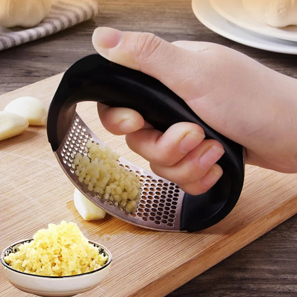 Stainless steel garlic crusher - kitchen tool