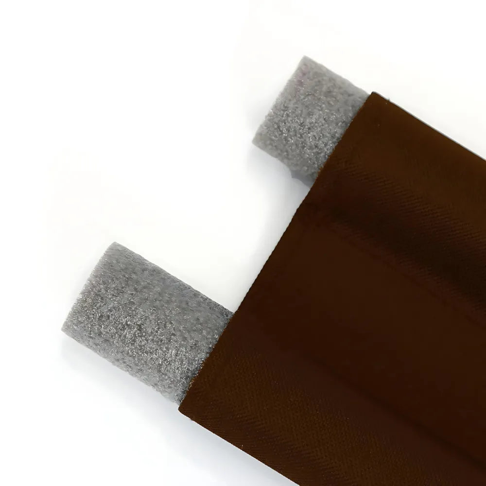 Brown fabric door draft stopper.