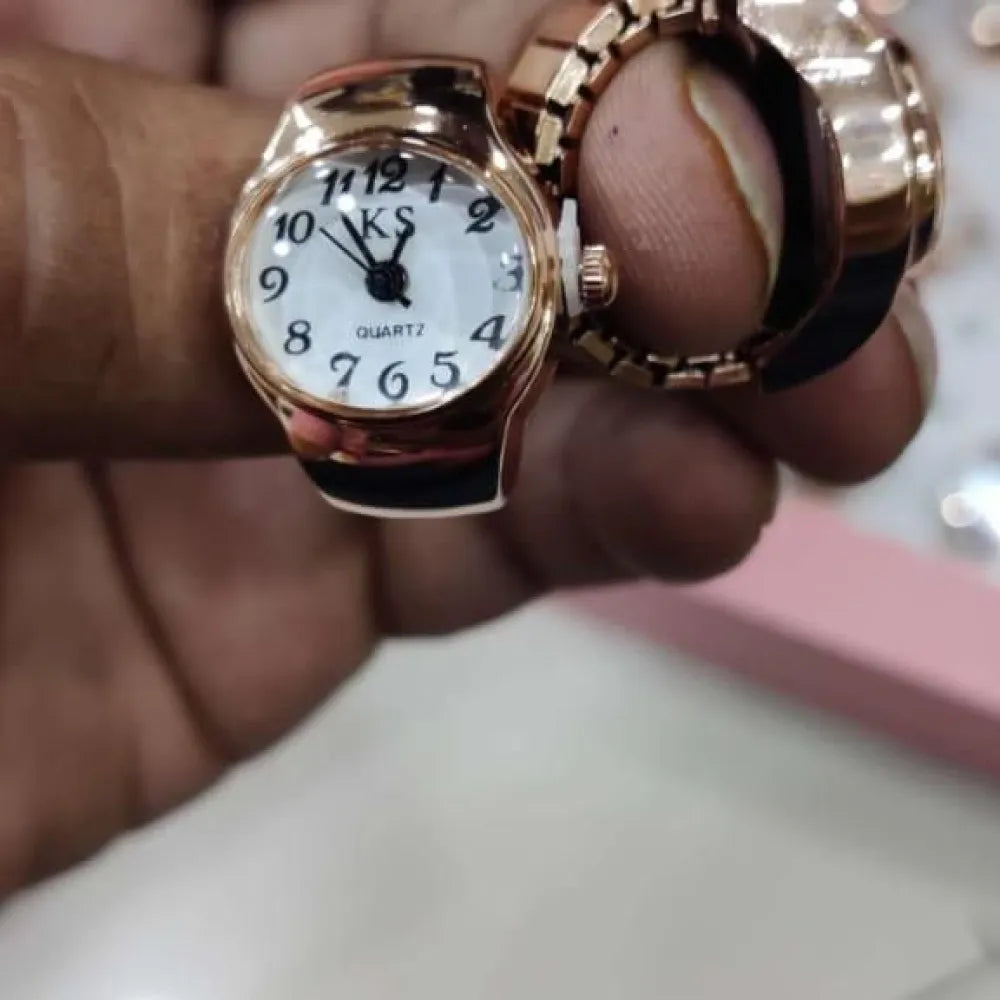 Finger watch ring.
