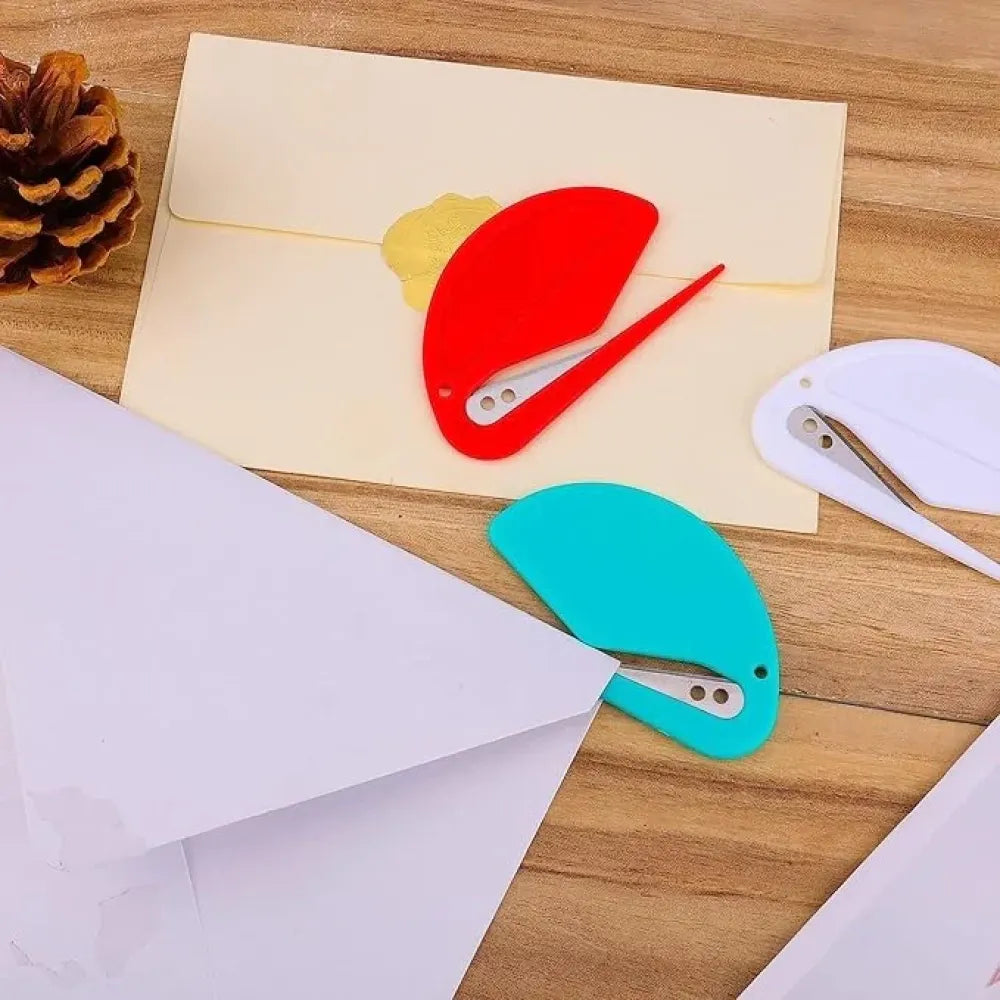 Wrapping paper roll cutter