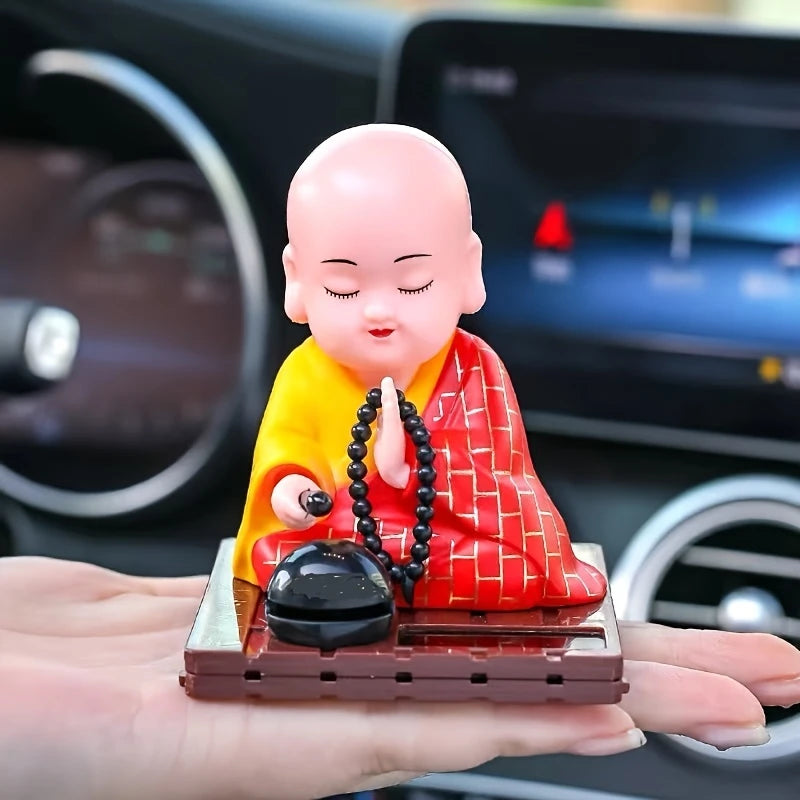 Solar moving buddha statue
