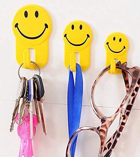 Self-adhesive smiley face hooks