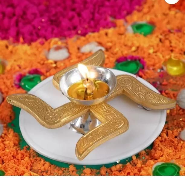 Brass swastik diya