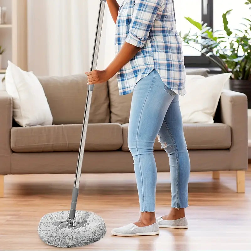 Self-wringing spin mop