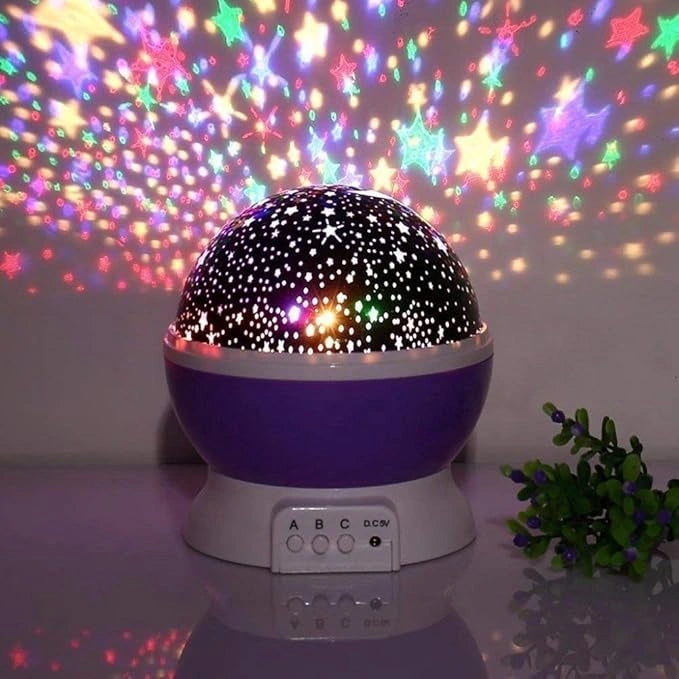 Rotating star projection lamp