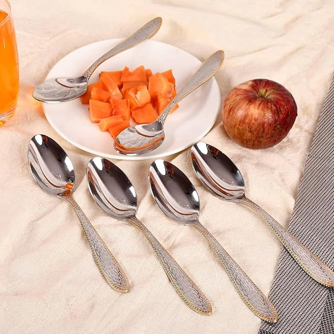 Gold-bordered stainless steel spoons