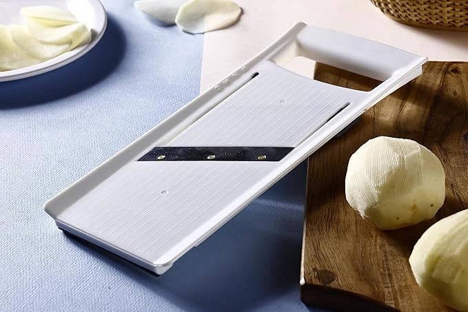Adjustable vegetable slicer