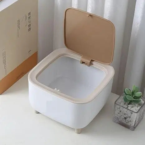 Push-button desk bin