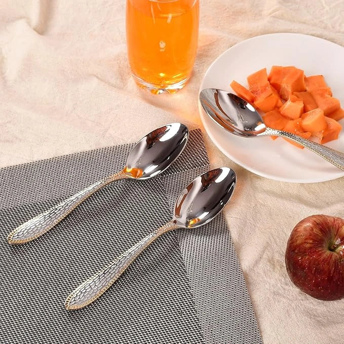 Gold-bordered stainless steel spoons