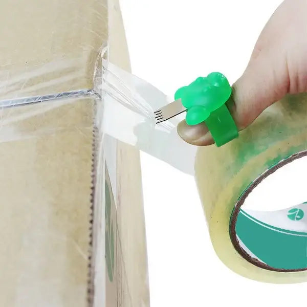Portable finger tape cutter