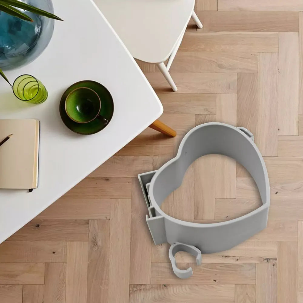 Adhesive hair dryer holder