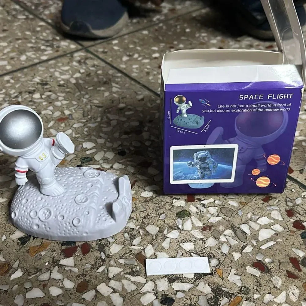 Astronaut phone stand