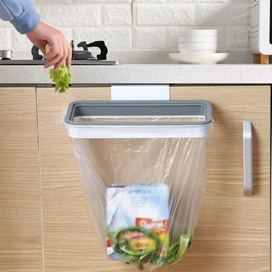 Attach-a-trash hanging trash bag holder