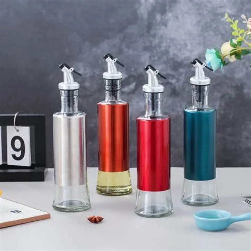 Automatic oil dispenser bottle