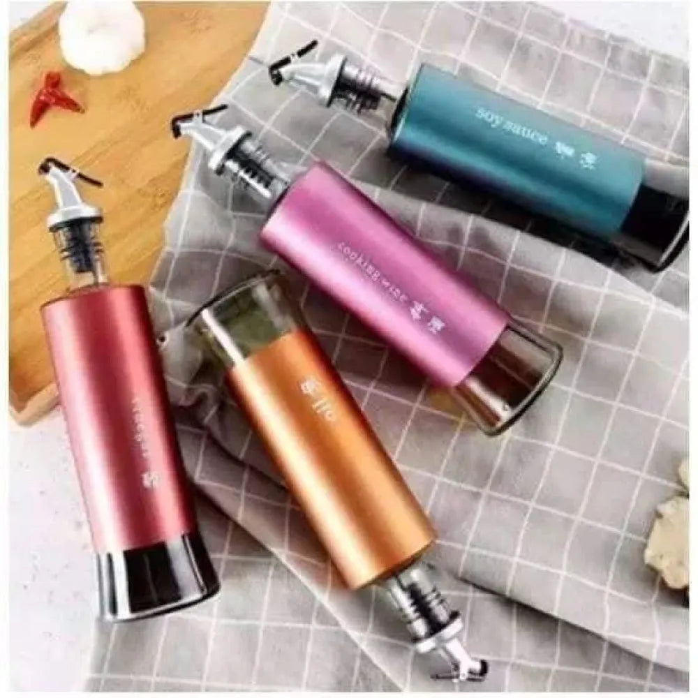 Automatic oil dispenser bottle