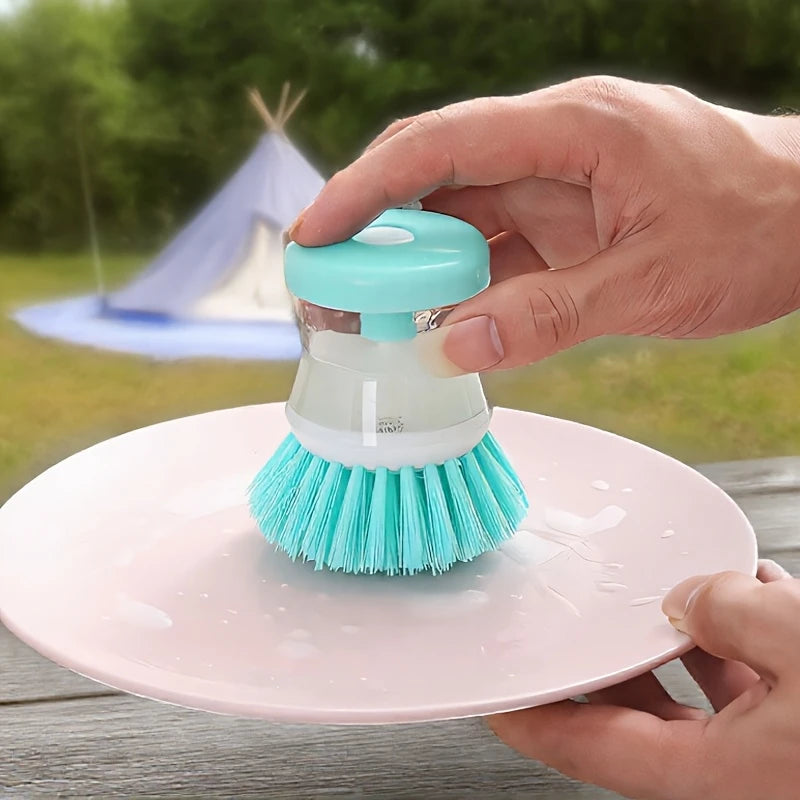 Soap-dispensing scrub brush
