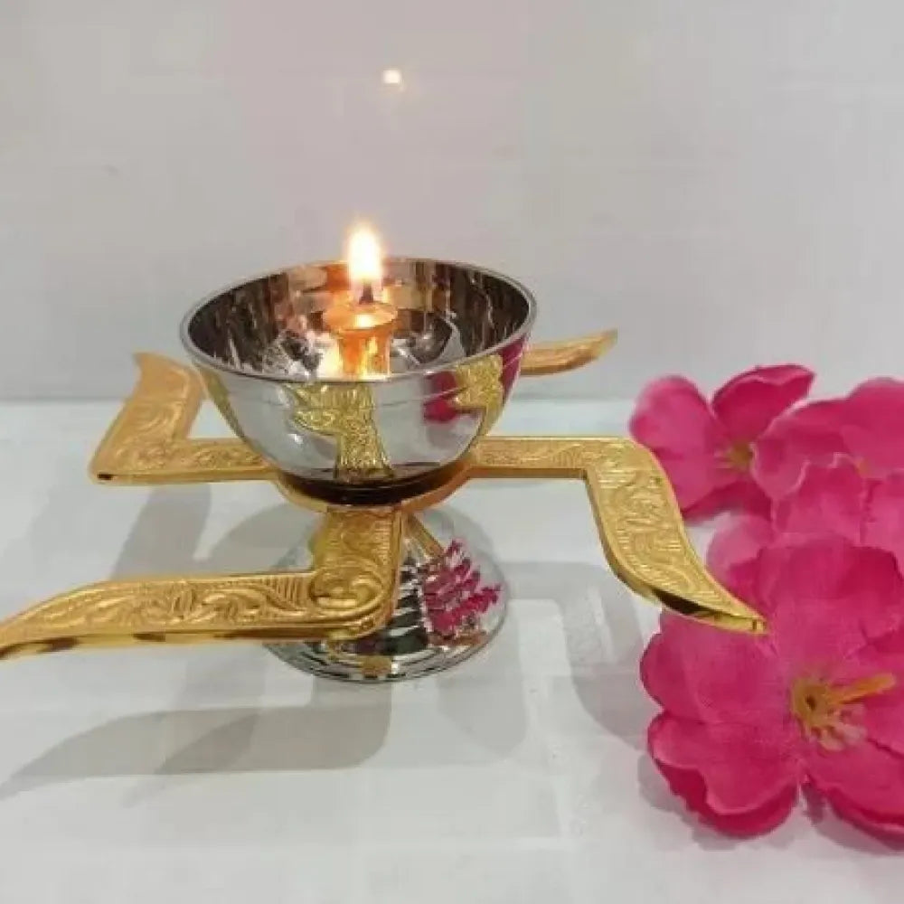 Brass swastik diya