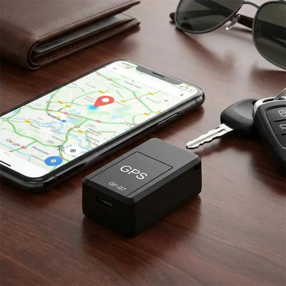 Compact gps tracker with voice monitoring - automotive