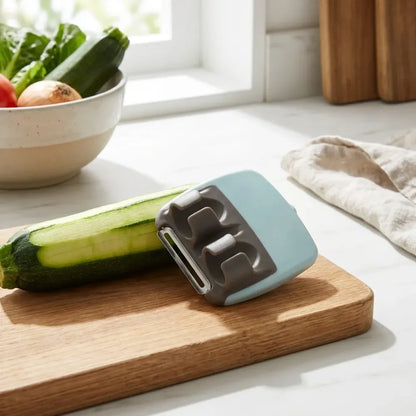 Ergonomic finger peeler - kitchen tool