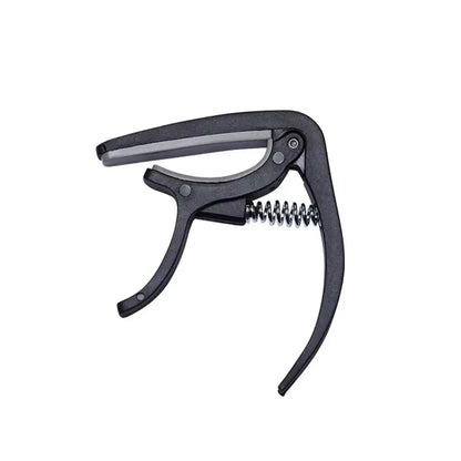 Guitar capo with pick holder - home improvement