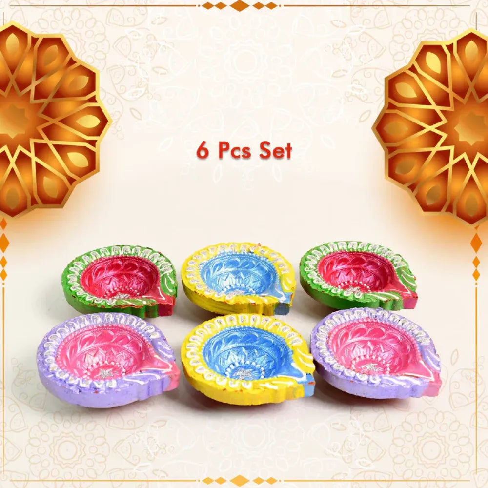 Hand-painted clay puja diya set