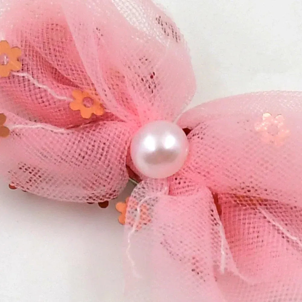 Heart-shaped bow hair clip