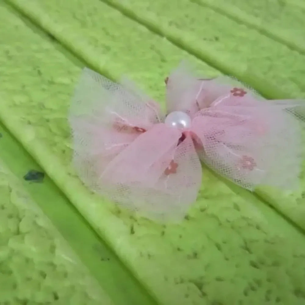 Heart-shaped bow hair clip