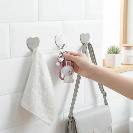 Invisible adhesive hooks - home improvement