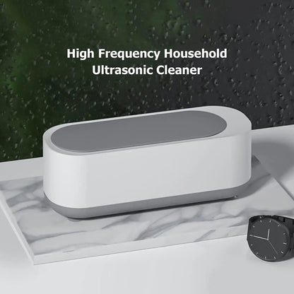 White and gray ultrasonic cleaner.