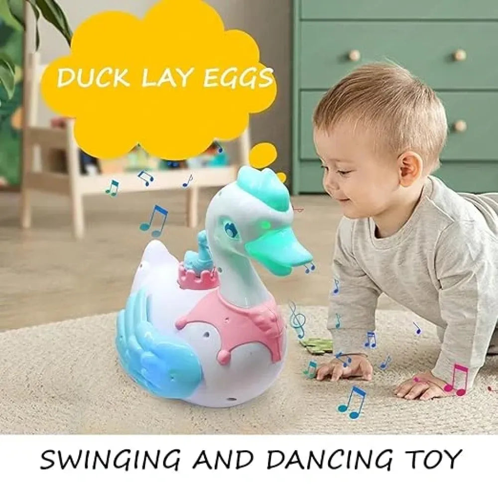 Musical swan egg-laying toy