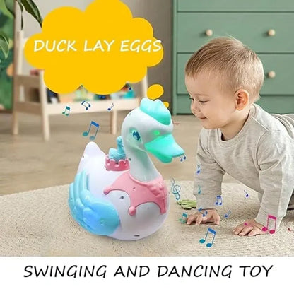 Musical swan egg-laying toy