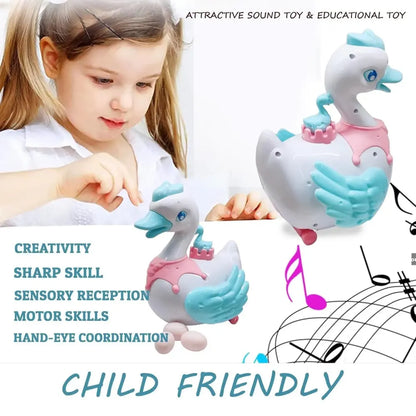 Musical swan egg-laying toy