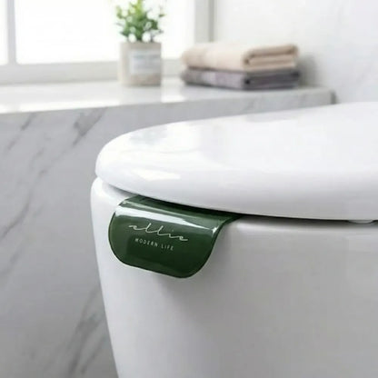No-touch toilet seat lifters