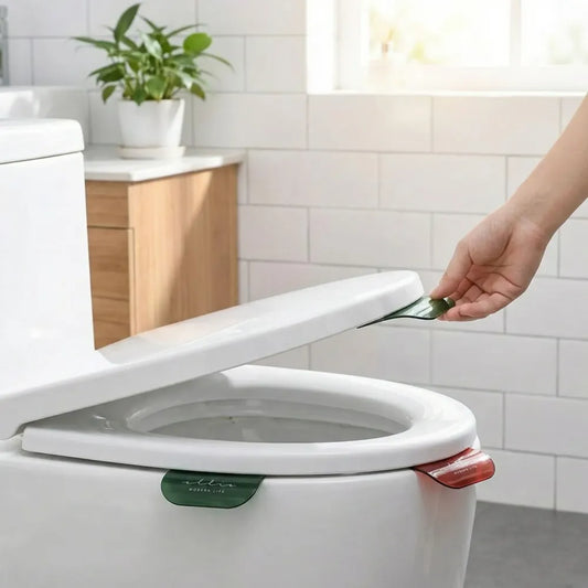 No-touch toilet seat lifters