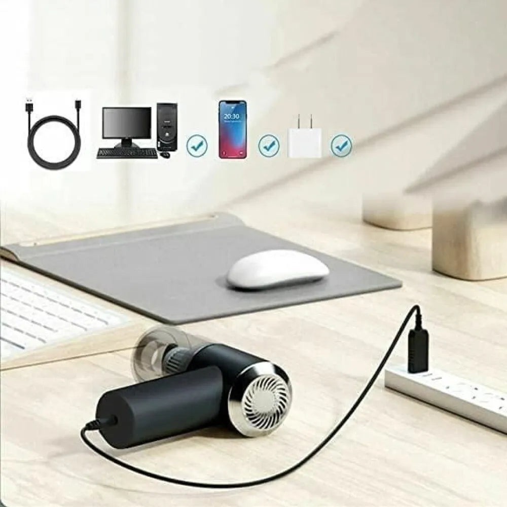 Black and silver handheld vacuum cleaner.